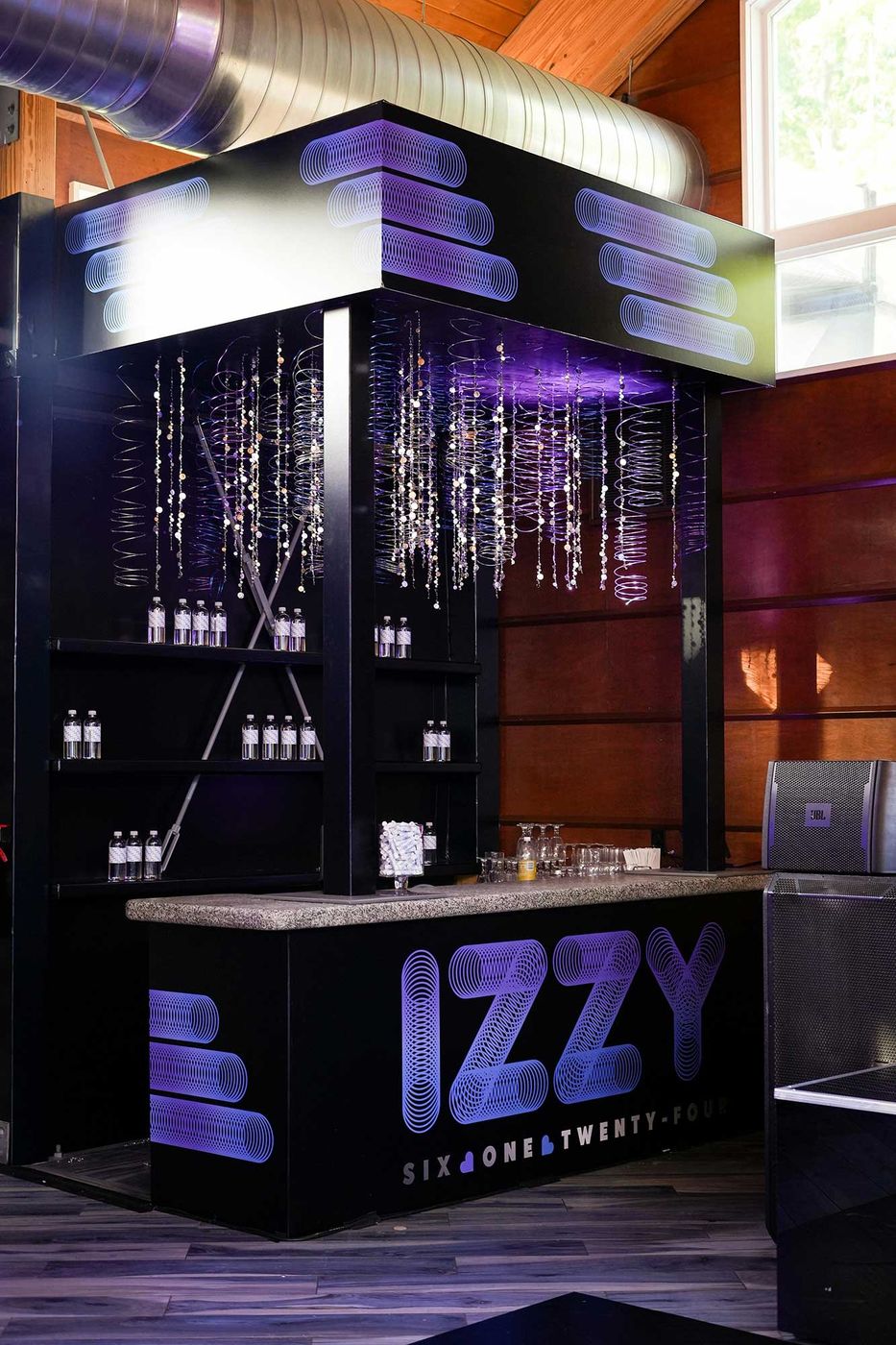 Bar wrapped in a custom graphic with the guest of honor's name